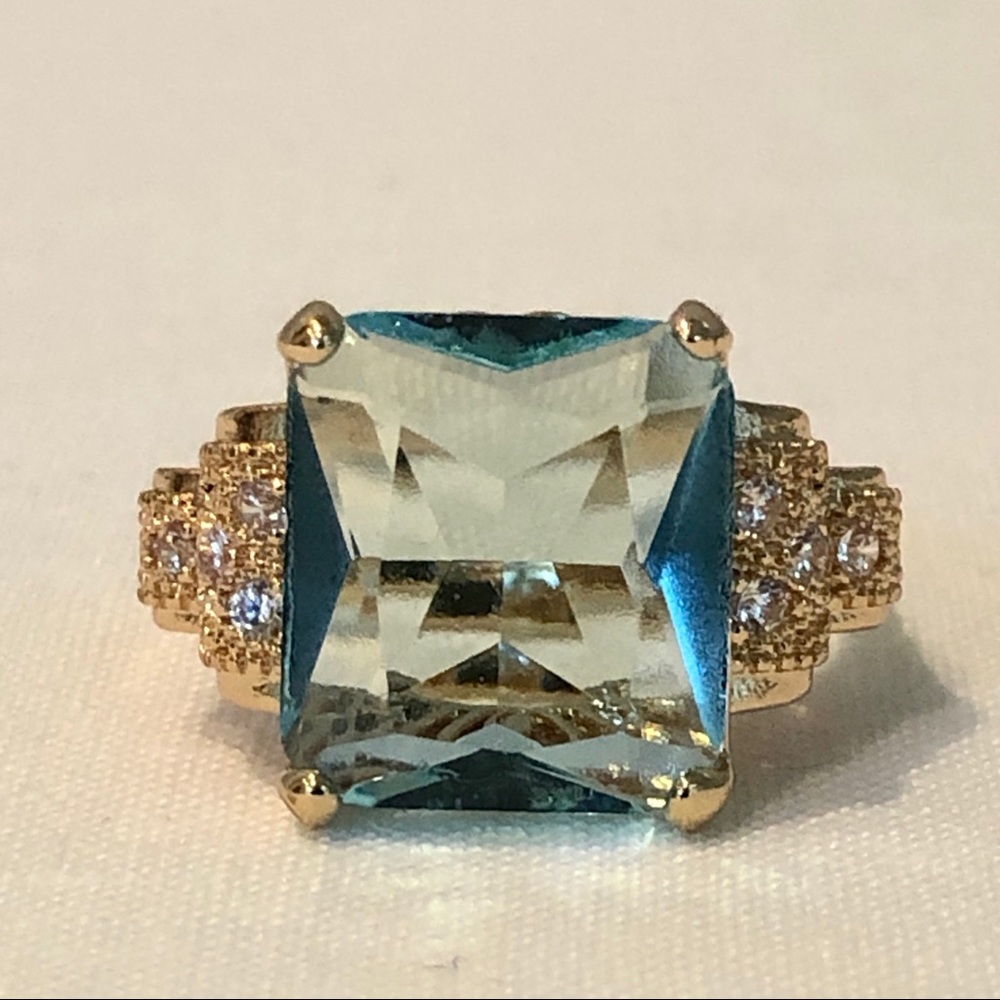 Huitan Gold Ring with Light Blue Square Gem and Clear Accents